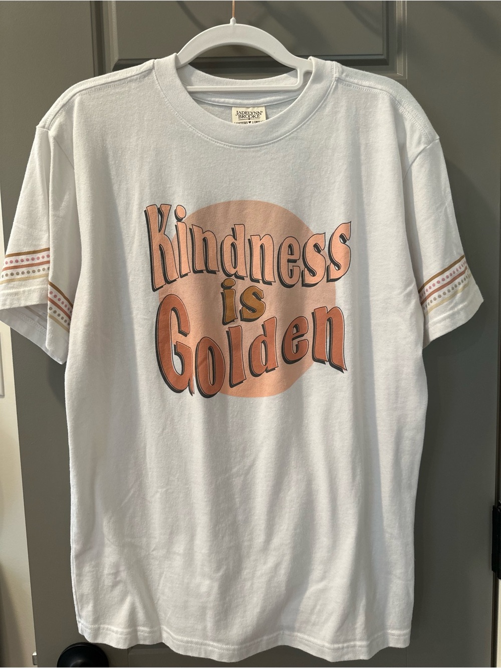 Jadelynn Brooke White Tee with Peach/Gold 'Kindness is Golden' Graphic